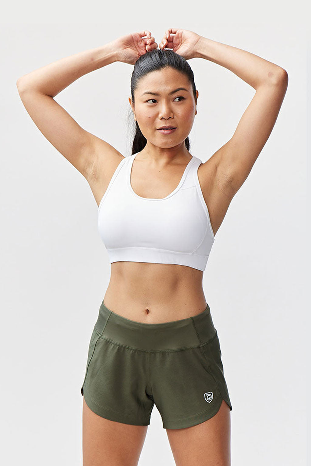 Dark moss green Excel women's workout training shorts by Goal Five, featuring a comfortable elastic waistband and breathable fabric.